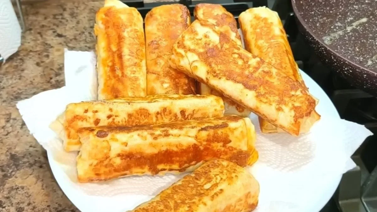 Хрусткі рулетики з лаваша з грибами, перцем і сиром